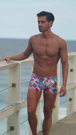 tribe botanical swim trunk multi 91384-1 2 inch inseam euro retro swim trunks mens luxury performance high end resort swimsuit drawstring elastic waistband sexy skimpy fun playful great body guys fashionable resort vacation swim floral print unique high end designer good quality best hot slim fit tight short show off gym body good butt classy funny unusual bontanist stylish luxe bombshell hottie diva online shopping enthusiast buys often beauty maven wealthy influencer instagram mens swimsuits website celeb