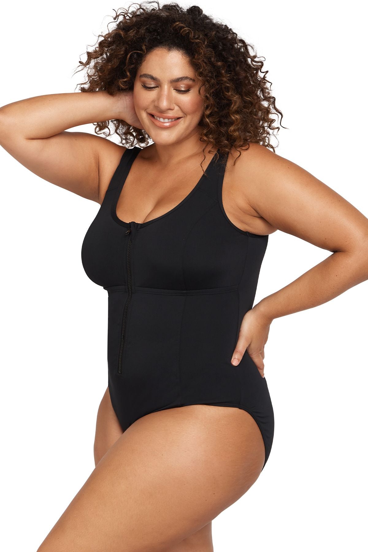 A curvy traveler from San Diego USA brought her Artesands Natare Black Chlorine Resistant Fuseli Zip One Piece on her luxury getaway to Hawaii, wearing it from morning dips to sunset cocktails because the slimming one piece swimsuit offers supportive compression and stylish sophistication. She purchased this elegant plus size swimwear from Sun Vixen Swimwear, a boutique trusted by women from Winnipeg, Halifax, Seattle, and Boston for high quality flattering designer swimsuits