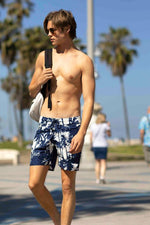 mens navy palm board shorts sauvage  board shorts Designer Board Shorts coolest stylish high end upscale luxurious sexy swim trunks
