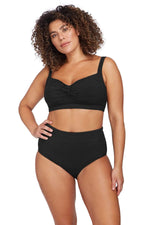 A plus size curvy woman from Los Angeles wearing Aria Botticelli high waist swim bottoms artesands to flatten her belly pooch look glamorous toned designer tummy control swimsuit bought from Sun Vixen Swimwear for best supportive plus size bathing suits, tummy control swimsuits, slimming curvy bathing suits high quality vacation swimwear. She is a luxury shopper who shops premium quality swimsuits. This top rated boutique has 5 star ratings from customers Toronto, Miami, Dallas, Vancouver, Montreal, Calgary