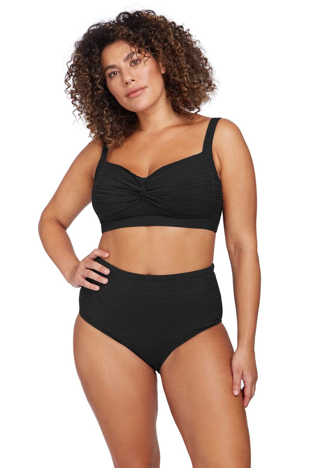 A plus size curvy woman from Los Angeles wearing Aria Botticelli high waist swim bottoms artesands to flatten her belly pooch look glamorous toned designer tummy control swimsuit bought from Sun Vixen Swimwear for best supportive plus size bathing suits, tummy control swimsuits, slimming curvy bathing suits high quality vacation swimwear. She is a luxury shopper who shops premium quality swimsuits. This top rated boutique has 5 star ratings from customers Toronto, Miami, Dallas, Vancouver, Montreal, Calgary