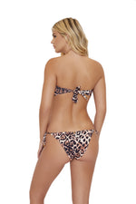 A woman from Philadelphia is wearing a cougar ring bandeau bikini top with teeny bikini bottoms pq swim designer swimwear leopard print strapless bikini top best quality cheeky animal print bikini bottoms she purchased online from sun vixen swimwear usa canada. order online bold flashy swimsuits Ibiza party sexy bikini skimpy bikini bottoms. She also bought luxury bikinis, high end beach cover ups, cheeky bikini bottoms, glamorous bathing suits from this boutique swimwear for her lavish beach vacation 
