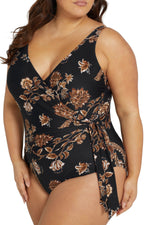 The black floral Chantique Hayes underwire tummy control Plus Size one piece swimsuit is worn by curvy plus size shoppers in Miami, Houston, San Diego USA and Vancouver, Edmonton, Winnipeg Canada, offering luxury tummy control compression, sculpted curvy shaping, classy flattering one piece swimsuit, elegant high end designer quality, and premium shapewear support for belly pooch. It’s worn for luxury travel to Turks and Caicos, Bora Bora, Maui, Mykonos, Cancún, and is best slimming tummy control swimsuits 