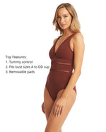 Woman shopping online for best swimsuits for curvy body. She came across belly flattening best plus size bathing suit on sun vixen swimwear USA Canada that sells most flattering luxurious sexy designer swimsuits for bigger women. This lady from Dallas Texas purchased Lola Shimmer Cinnamon Cross Front Spliced Multifit One Piece rust swimsuit designed by sea level Australia known for their sculpting elegant bathing suits for moms. Buy classy tummy control designer swimwear full coverage good quality swimwear
