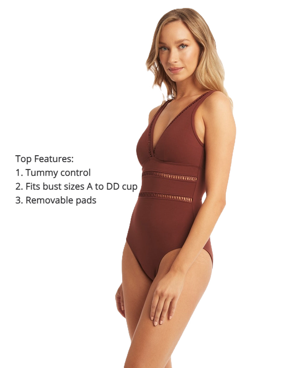 Woman shopping online for best swimsuits for curvy body. She came across belly flattening best plus size bathing suit on sun vixen swimwear USA Canada that sells most flattering luxurious sexy designer swimsuits for bigger women. This lady from Dallas Texas purchased Lola Shimmer Cinnamon Cross Front Spliced Multifit One Piece rust swimsuit designed by sea level Australia known for their sculpting elegant bathing suits for moms. Buy classy tummy control designer swimwear full coverage good quality swimwear
