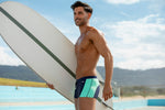 Tribe navy mint square cut swim shorts barbados grenada 2 inch inseam european style mens swim boxers sporty classy sophisticated provocative gay mens stylish fashionable resort swimwear beach vacation best hot body swimwear shows off legs super short mens brief swimmers hottest style classy men single guy beach body travels often dapper look online shopping enthusiast buys luxury goods frequently travels often socialite wealthy disposable income high earner sexiest mens swim shorts super tight pride design