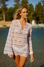 PQ Swim Noah Tunic White Lace Cover Up best quality edgy elegant exotic exquisite best quality  boutique classy bathing suits. A rich woman in her 30s bought a luxury bikini cover up with a lace white bikini for her resort beach vacation. This fashionista from New york always shops online from sun vixen swimwear a top rated designer swimwear store on google that sells best  quality swimsuits to shoppers who love luxury swimsuits, glamorous beach covers, sexy bikinis and like to travel to beach destinations