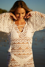 White Lace Cover Up Noah Tunic PQ Swim attractive awesome beautiful best quality  boutique classy daring designer edgy luxe bathing suits. Buy fancy bikinis from Sun Vixen Swimwear website an online boutique website that is intended for shopping mostly for women and men who live in canada and usa who have lot of disposable income so they look hot an glamorous and rich on a vacation. A wealthy women shopped a lace bikini cover up from this top rated website and is wearing her sexy bikini on her vacation 