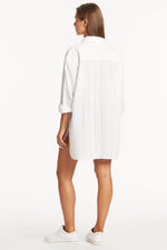 white button down cover up heatwave sea level australia oversized pretty comfy roomy long sleeve high end luxury bikini swimwear cover up beach shirt ladies cute pretty expensive vacation fashionista trendy collar cotton cool sexy goes with everything upscale online shopper enthusiast travels often curvy good quality designer swim over shirt quick dry textured fabric covers thighs stylish fashionable premium sophisticated smart looking rich wealthy socialite put together classy chic fancy exquisite popular 