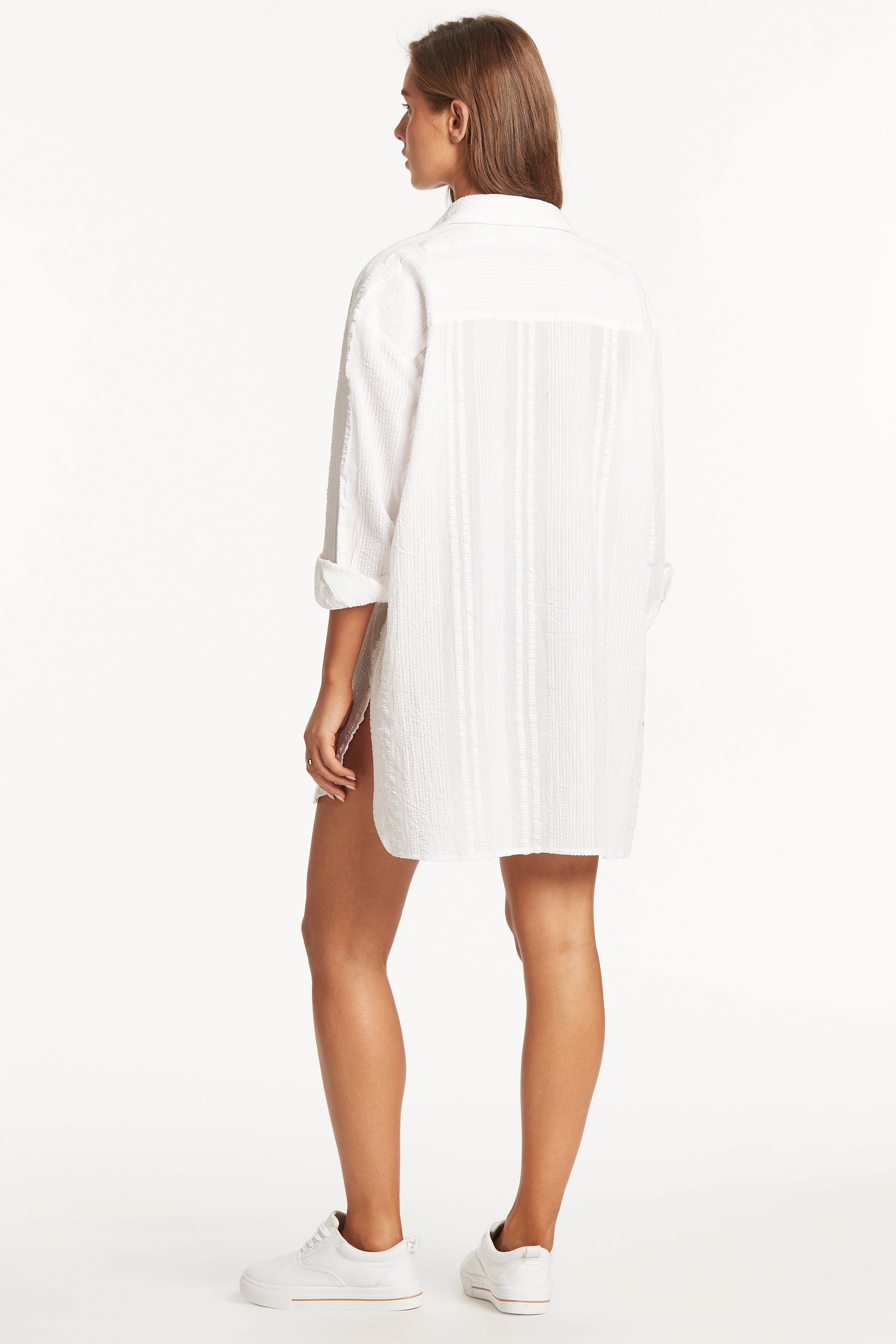 white button down cover up heatwave sea level australia oversized pretty comfy roomy long sleeve high end luxury bikini swimwear cover up beach shirt ladies cute pretty expensive vacation fashionista trendy collar cotton cool sexy goes with everything upscale online shopper enthusiast travels often curvy good quality designer swim over shirt quick dry textured fabric covers thighs stylish fashionable premium sophisticated smart looking rich wealthy socialite put together classy chic fancy exquisite popular 